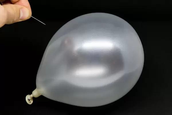 Luftballon platzt