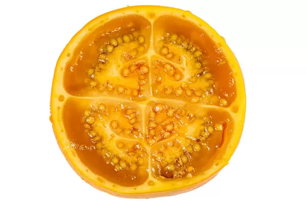 Lulo fruit or solanum quitoense half, top view