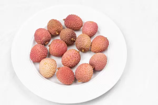 Lychee fruit served on the plate