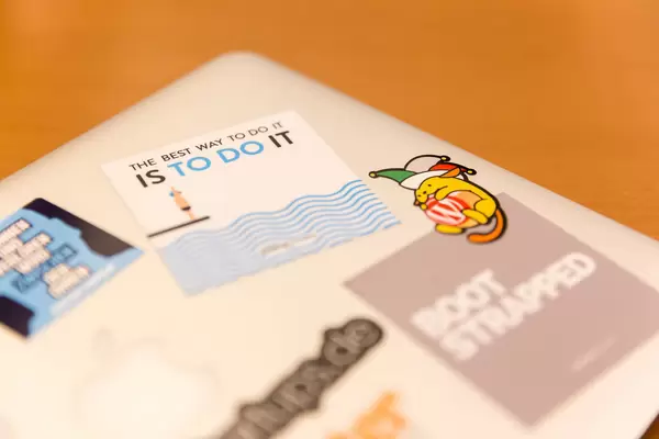 Macbook with Decals of startupvitamins: The best way to do it is to do it