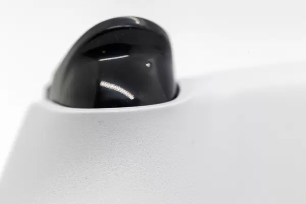 Macro image of a detail of the DualSense Controller for PlayStation 5 on white background