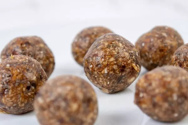 Macro image of Healthy Energy Balls on the plate (Flip 2019)