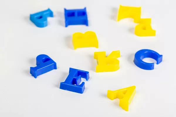 Magnet letters on white background