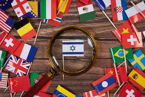 Magnifying glass on the flag of Israel