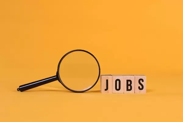 Magnifying glass with Jobs text