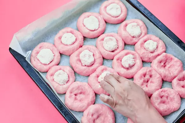 Making sourdough buns with cheese filling