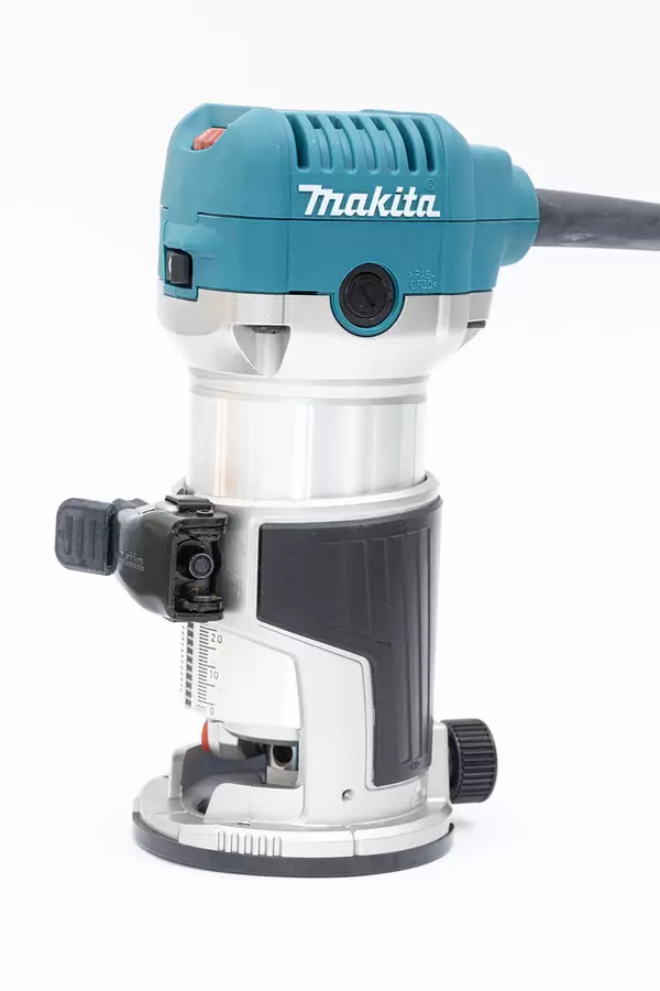 Makita Hand Router isolated above white background