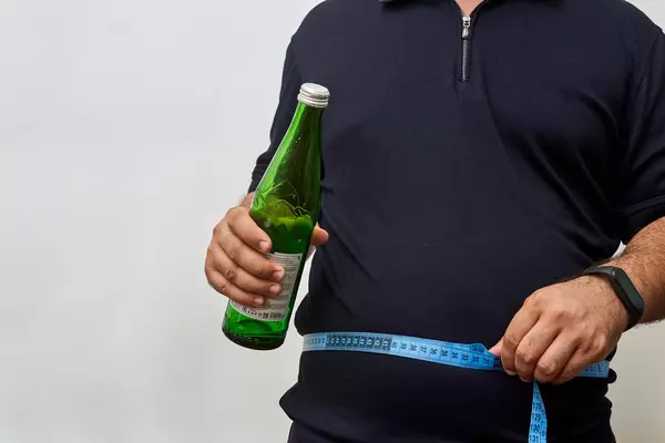 Male has alcohol and weight problems