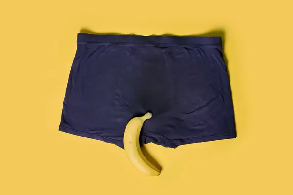 Male underwear with yellow banana in healthy sex concept