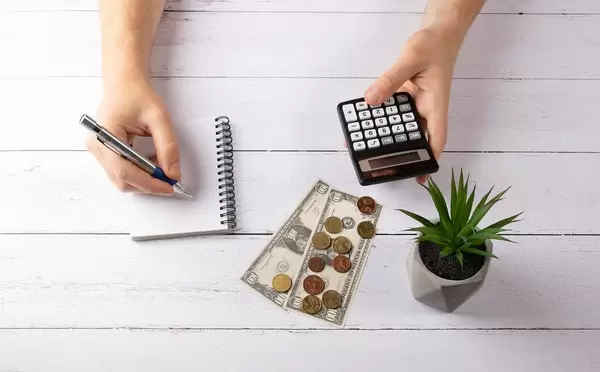 Man calculating expenses