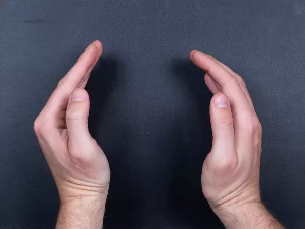 Man hands on black background with empy space (Flip 2019)