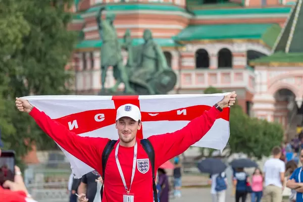 Man holding a flag of the City of London