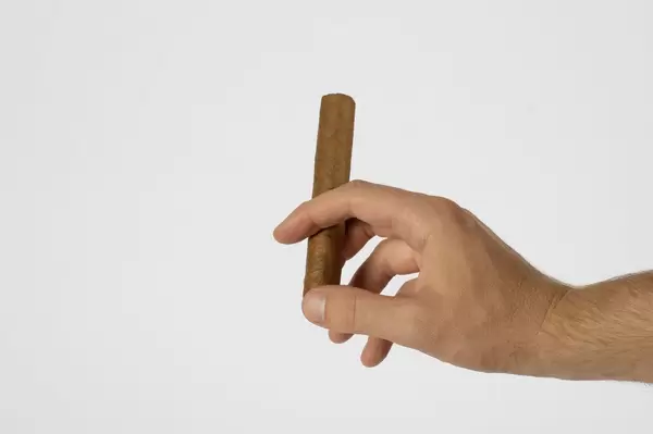 Man holding cigar