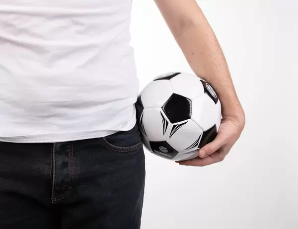 Man holding soccer ball