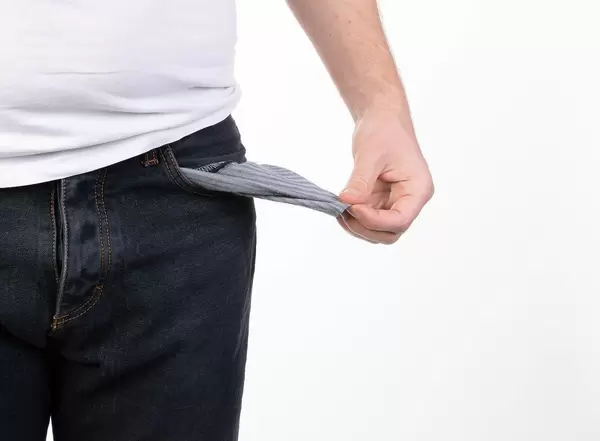 Man in jeans with empty pocket