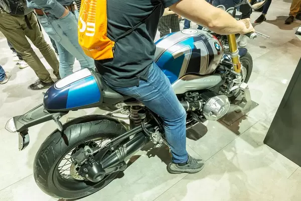 Man on the naked bike BMW R nineT, limited special model as homage to the legendary /5 series from the 60s