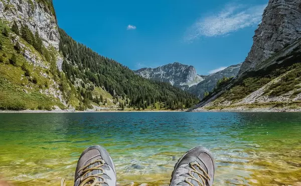 Man sitting on the beach of Krn lake