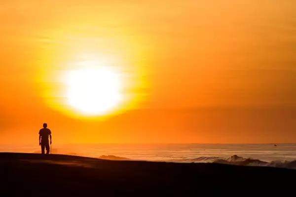 Man watching sunrise