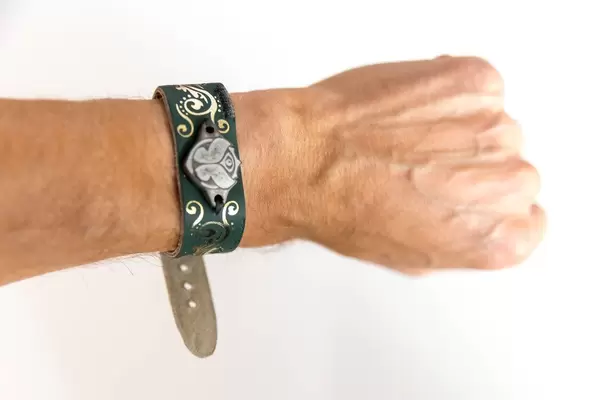 Man wearing the Tomorrowland Festival bracelet 2019 for the Belgium music festival