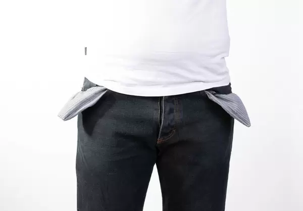 Man with empty pockets