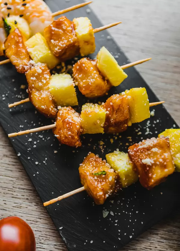 Mango Canape On Black Plate