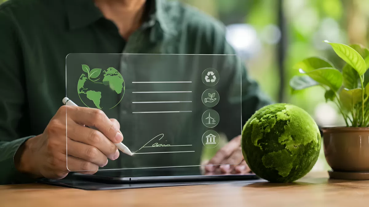 Mann unterzeichnet digitalen Nachhaltigkeitsvertrag auf Tablet