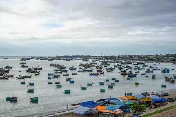Many Fishing Boats in the Harbour of Mui Ne, Vietnam  Flip 2019