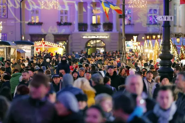 Many people at Christmas market in Sibiu, Romania (Flip 2019)