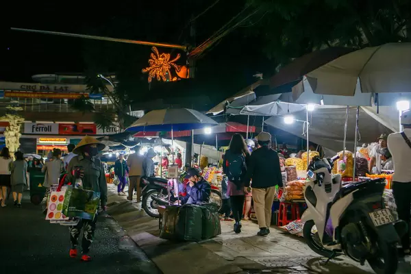 Many Shops selling different Items on the Street at the Night Market in Dalat, Vietnam