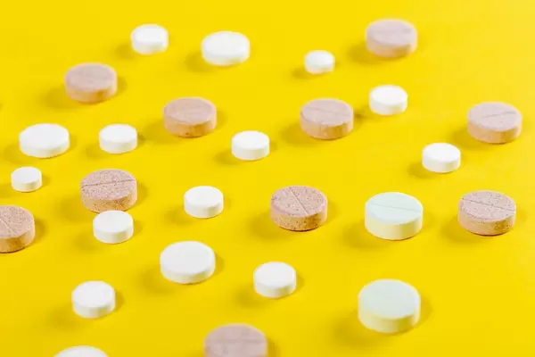 Many tablets on a yellow background (Flip 2019)