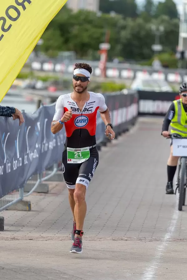 Marathon runner and top athlete Manuel Kueng takes third place at Ironman 70.3 Triathlon 2019 in Lahti, Finland