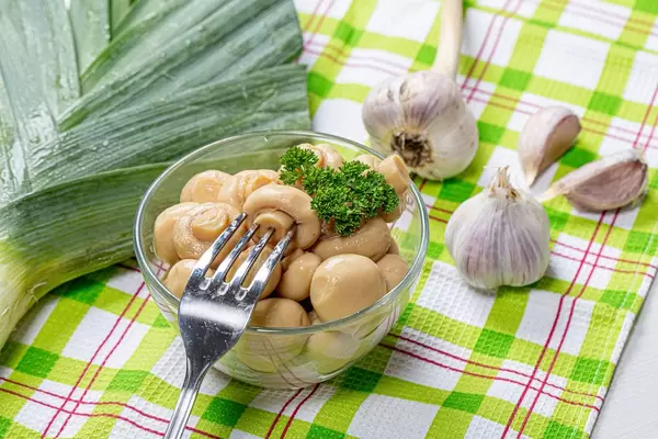 Marinated mushrooms in a glass bowl (Flip 2019)
