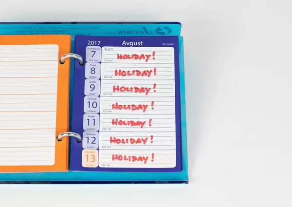 Marked and written holiday in a calendar