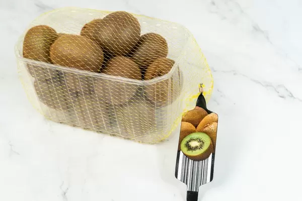 Market package with Kiwi fruit on the marble table (Flip 2019)