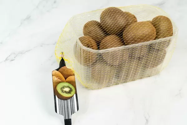 Market package with Kiwi fruit on the marble table