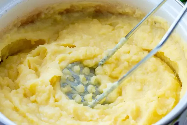 Mashed potatoes in a pan close-up (Flip 2019)