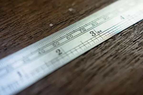 Measuring rule focused on 3 inch mark