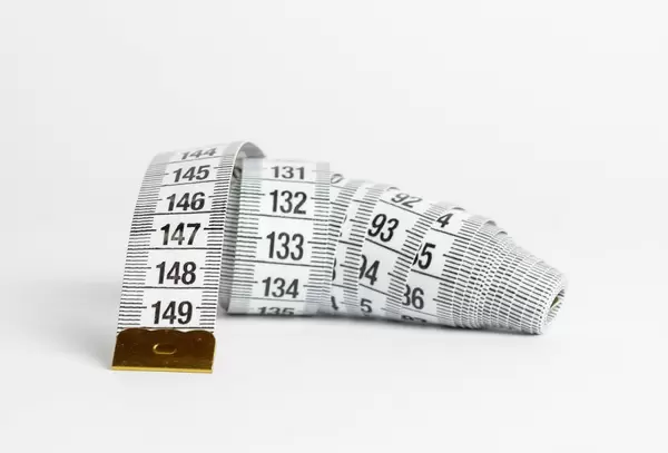 Measuring tape on white