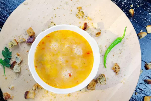 Meatball soup ith croutons and hot chili pepper (Flip 2019)