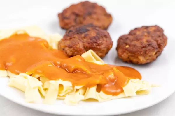 Meatballs served with Tomato Sauce on the homemade Pasta