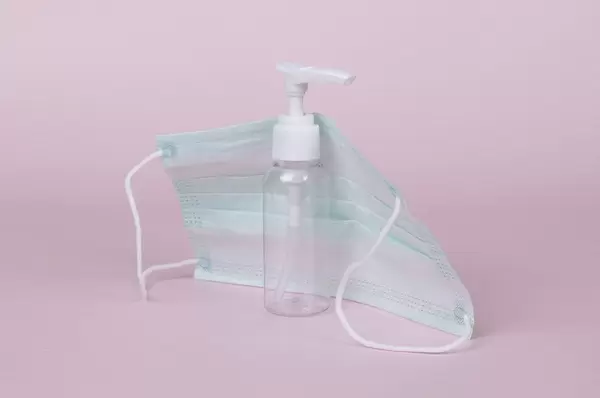 Medical face mask with sanitizer