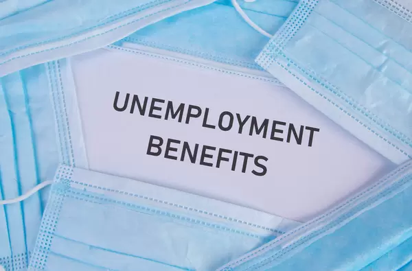 Medical face masks with Unemployment Benefits text