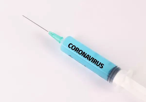 Medical syringe with Coronavirus text on it