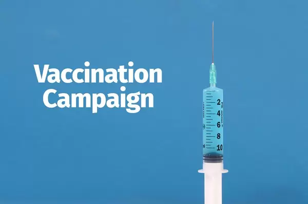 Medical syringe with Vaccination Campaign text