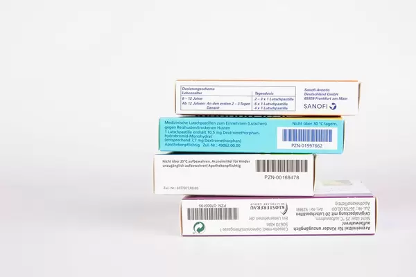 Medicine boxes on white background