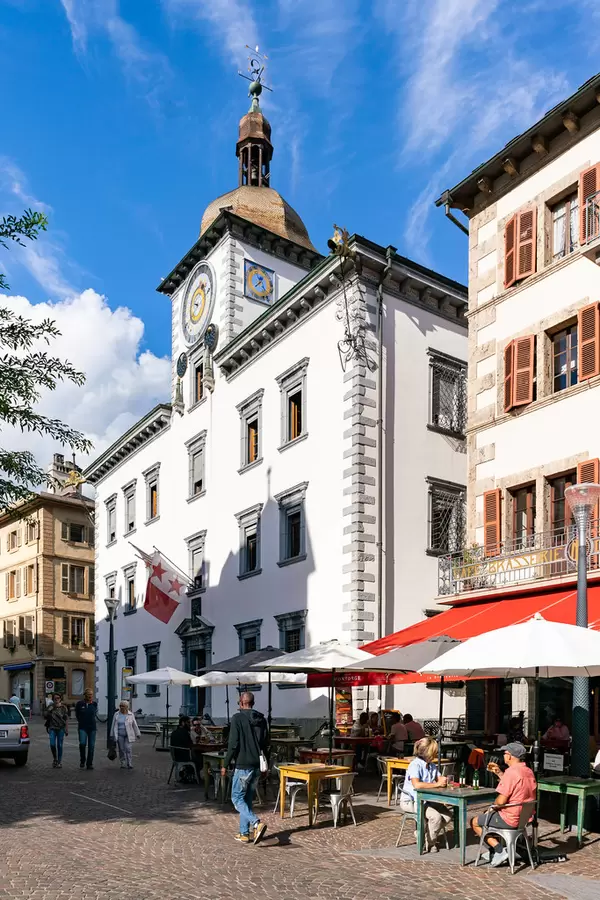 Medieval Swiss city hall of town of Sion with clock tower