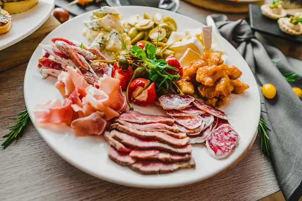 Mediterranean Antipast Asorti With Peppers, Cheese And Meat