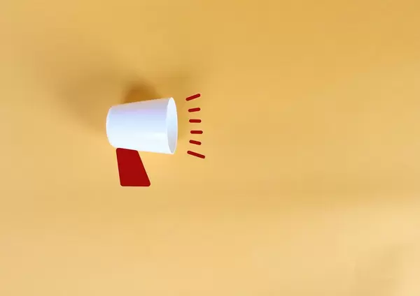 Megaphone on yellow background