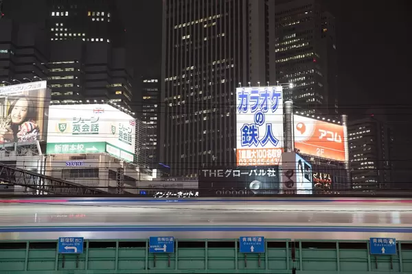 Ōmekaidō Station in Tokyo with billboards in the background