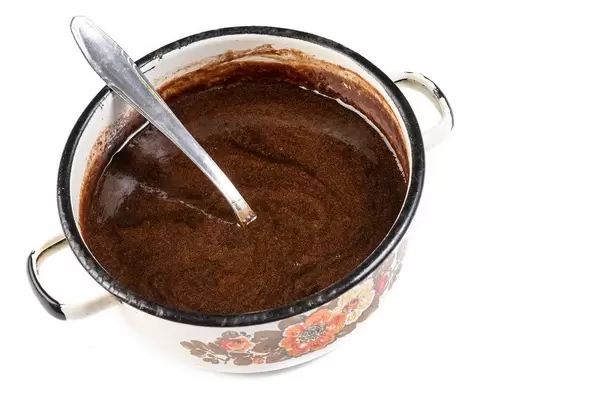 Melted Chocolate in the pot with spoon (Flip 2019)